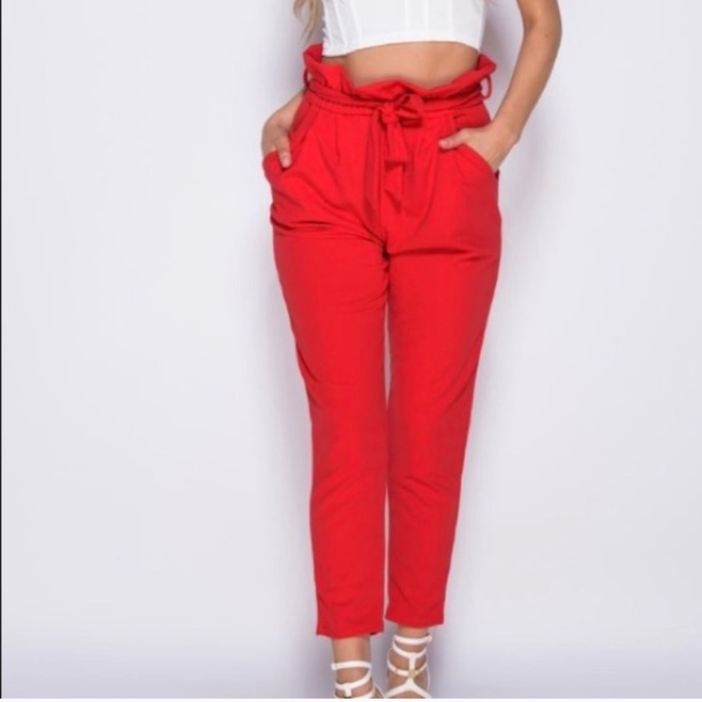 paper bag / red pants